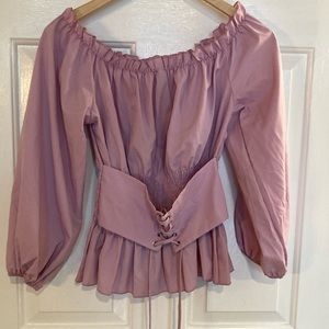 Woman’s lavender top